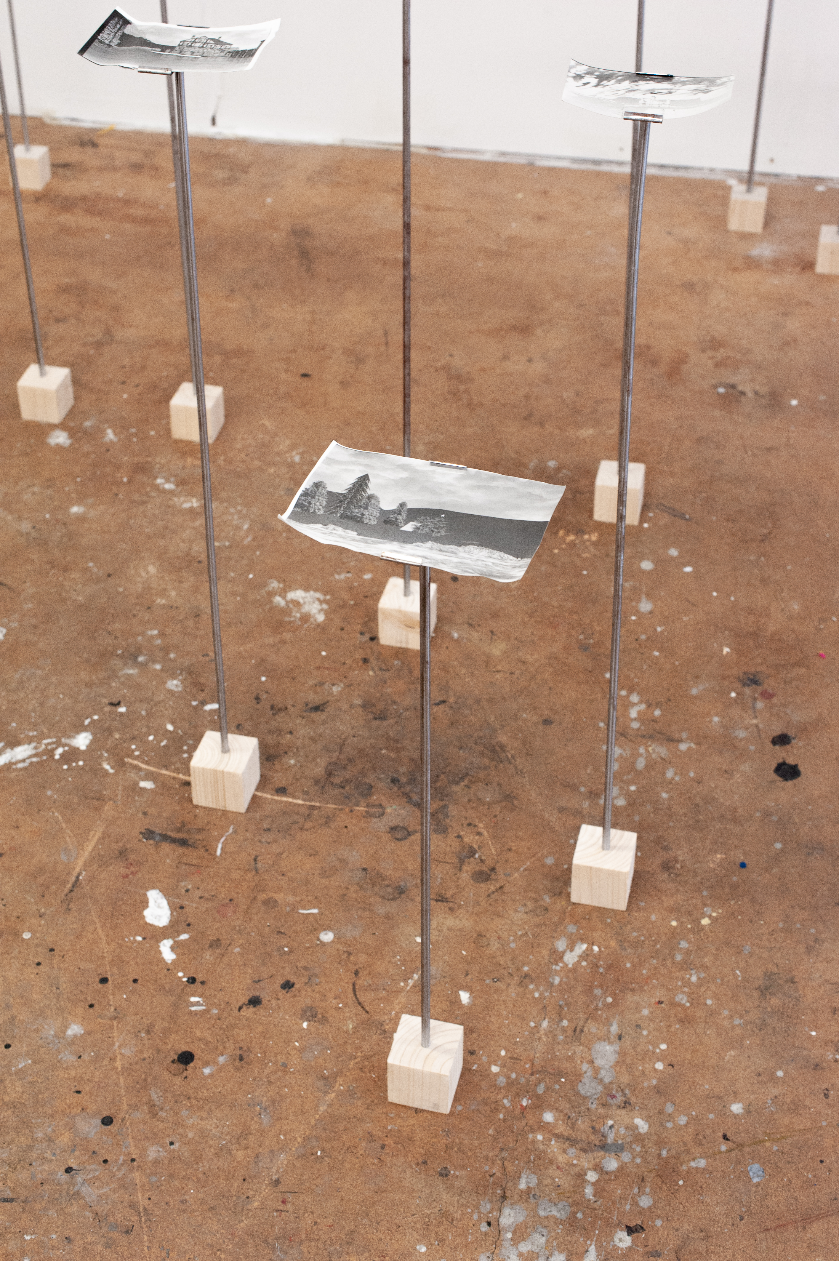 A close-up photograph of the warped and textured surface of the Agfa Brovira baryta paper.